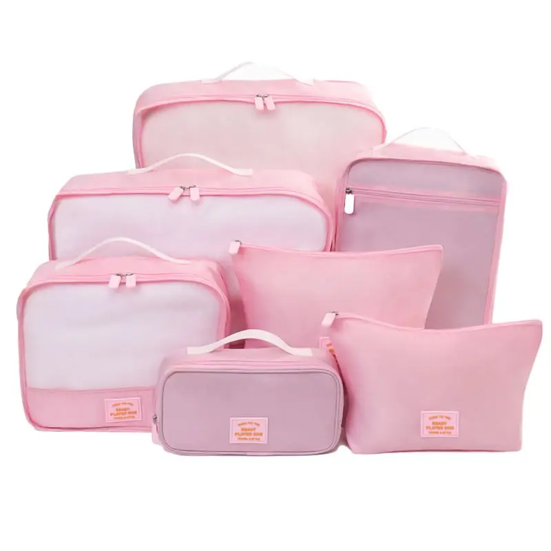 Set complet de 7 organizatoare călătorie roz pentru bagaje organizate.
